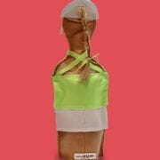 A bottle of wine with a green shirt on it