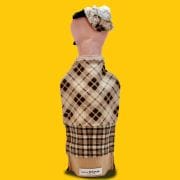 A mannequin wearing a plaid shirt and a hat.