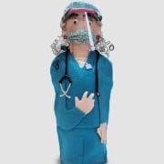 A surgeon doll with a mask and a stethoscope.