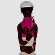 A person wearing a helmet and holding something.