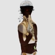 A person wearing a helmet and holding a stick