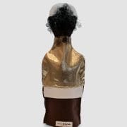 A bottle of wine with a gold jacket on it